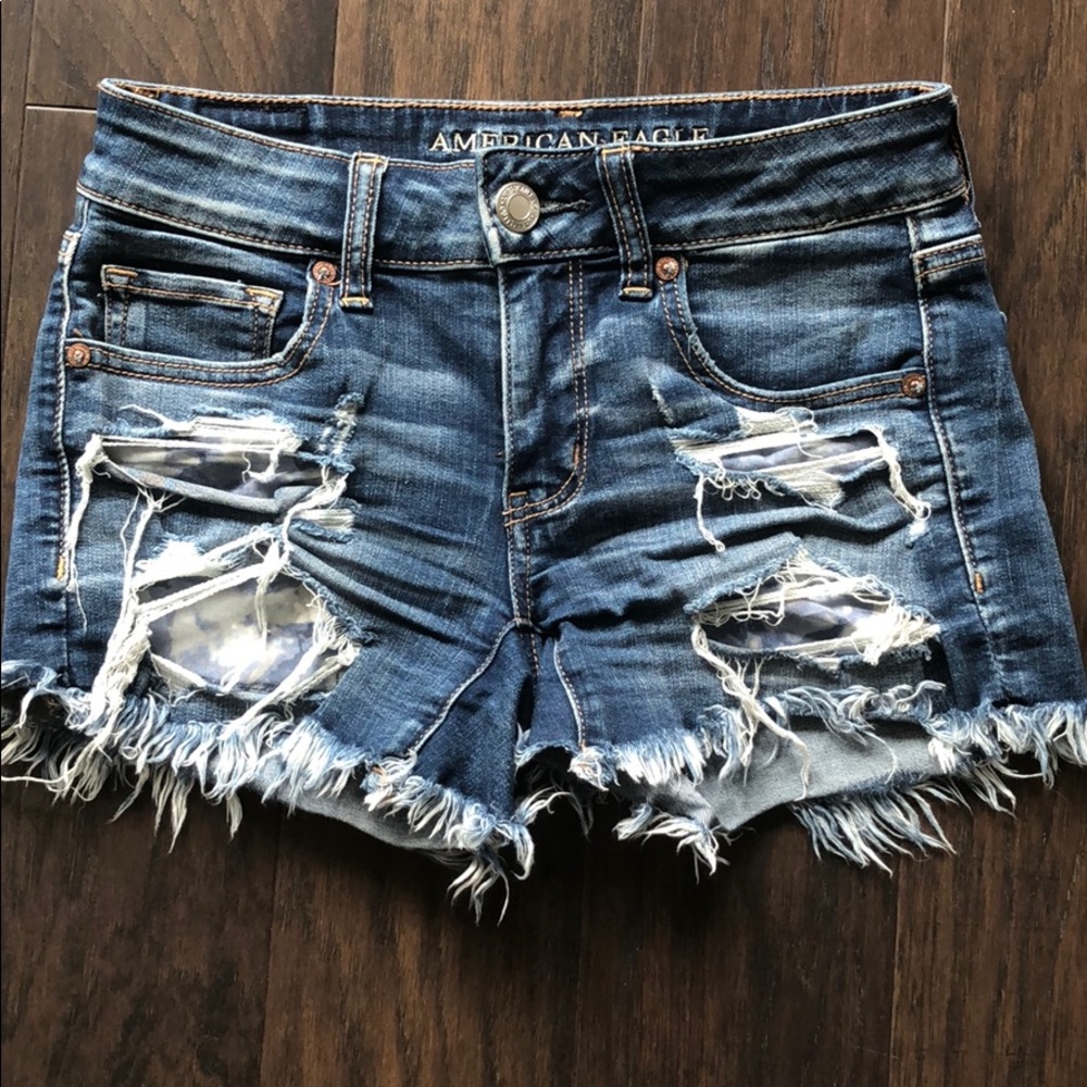 Super stretch, midi, distress with raw edge.